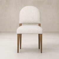 Marfa Dining Chair in Somerton Ash with plush, textured upholstery and rounded backrest.