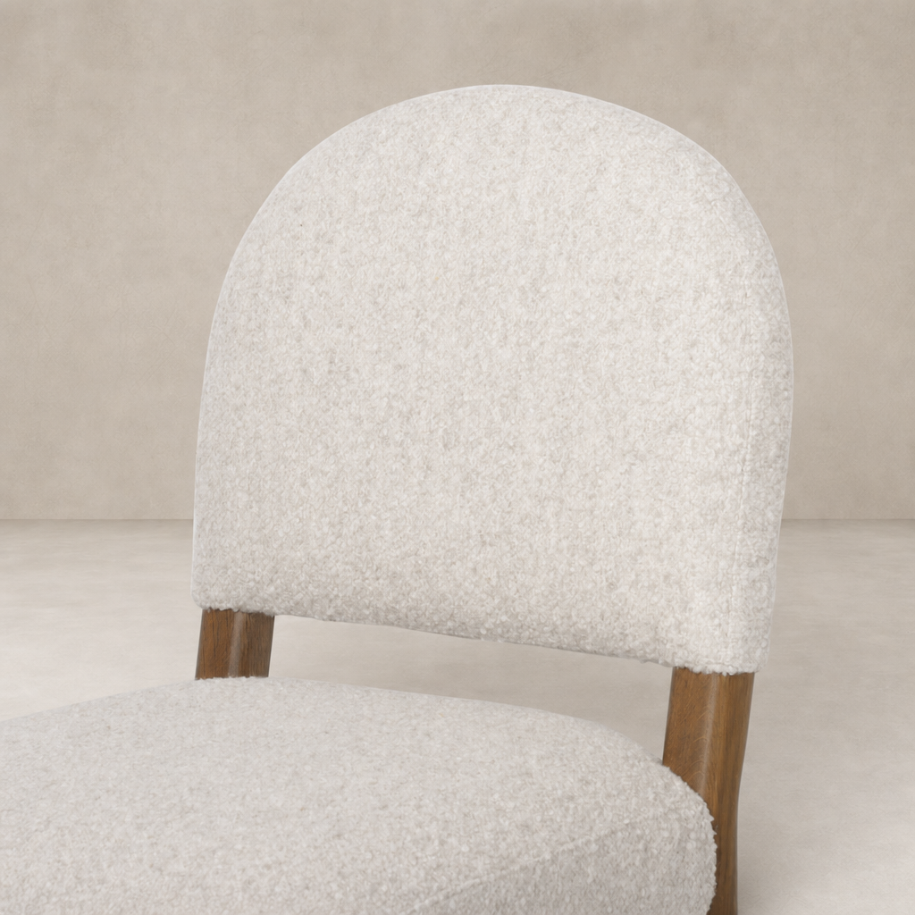 Marfa Dining Chair in Somerton Ash with a soft, rounded back and plush upholstery.