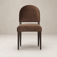 Marfa Dining Chair in Sapphire Coco features a curved back and plush upholstery.