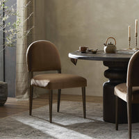 Marfa Dining Chair in Sapphire Coco with a sleek, modern design in a dining setting.