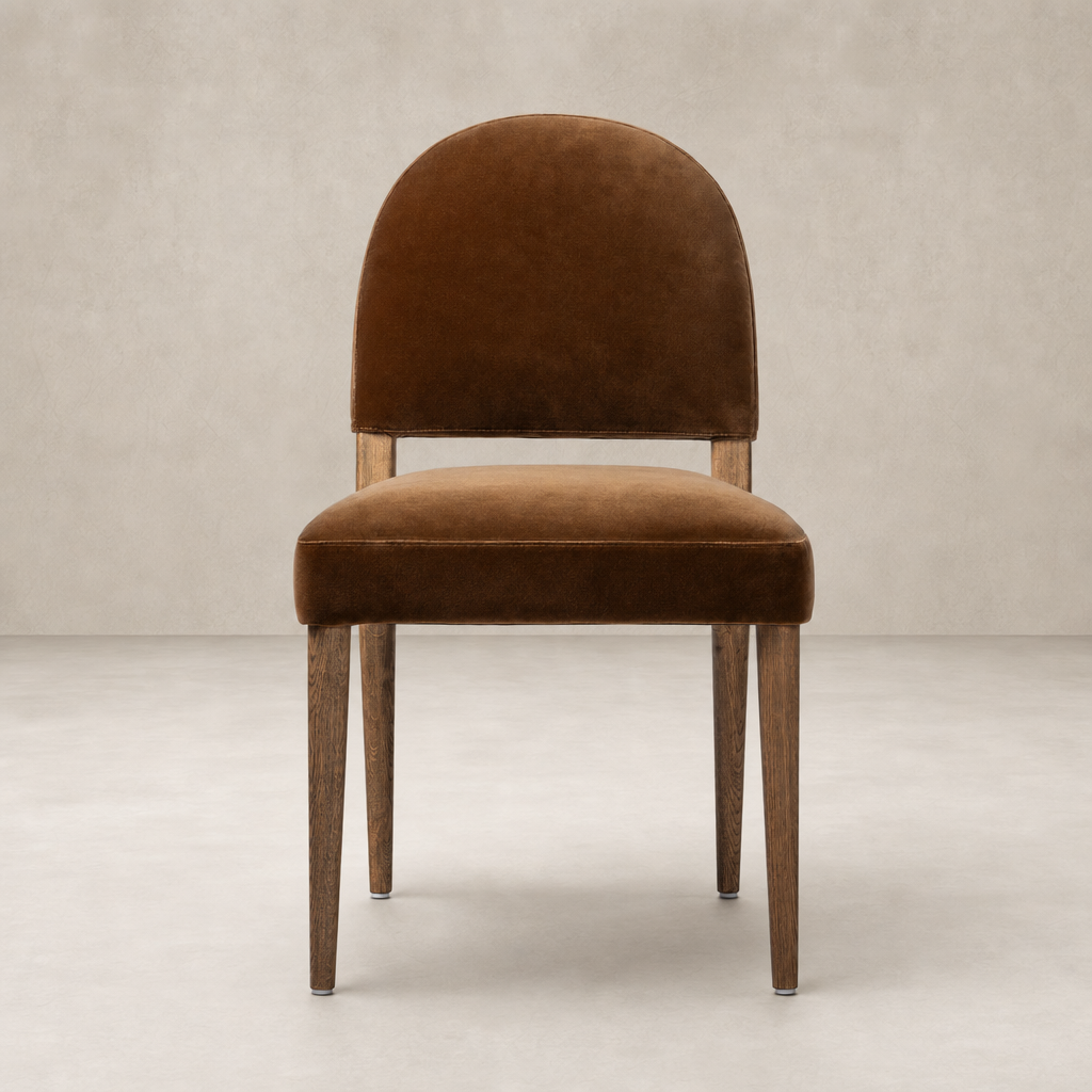 Marfa Dining Chair in Surrey Ochre with plush upholstery and stylish wooden legs.
