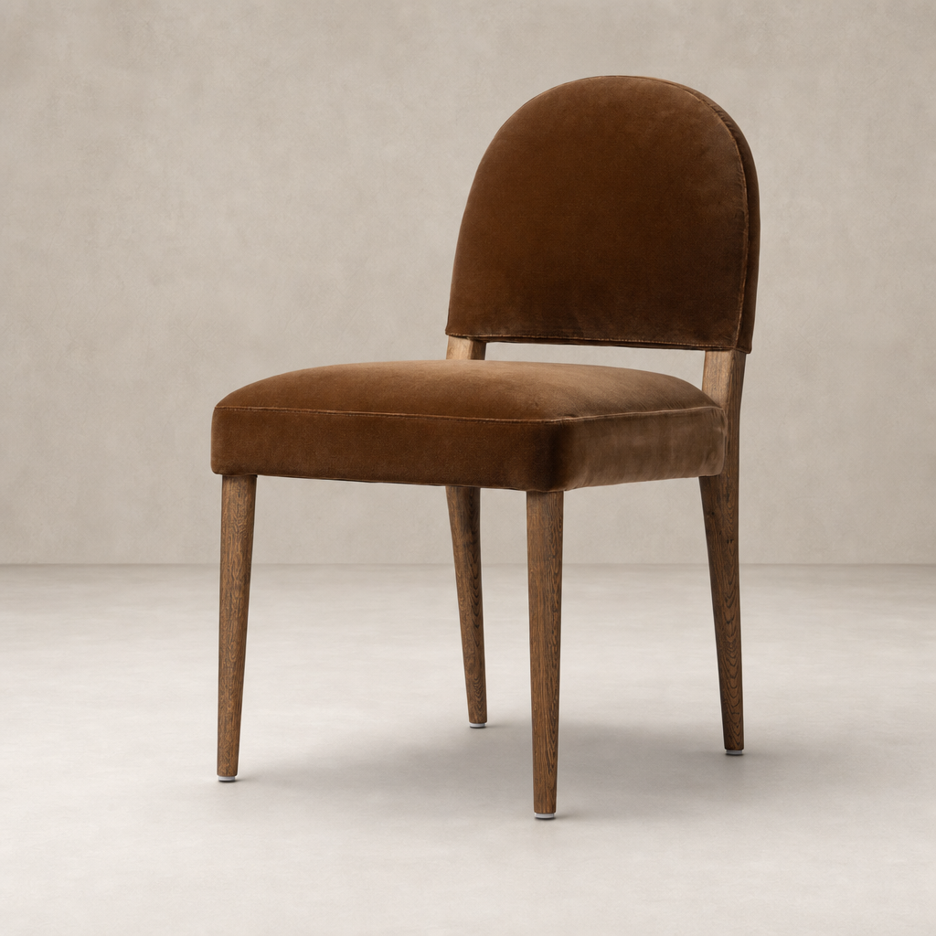 Marfa Dining Chair in Surrey Ochre with rounded back and wooden legs.
