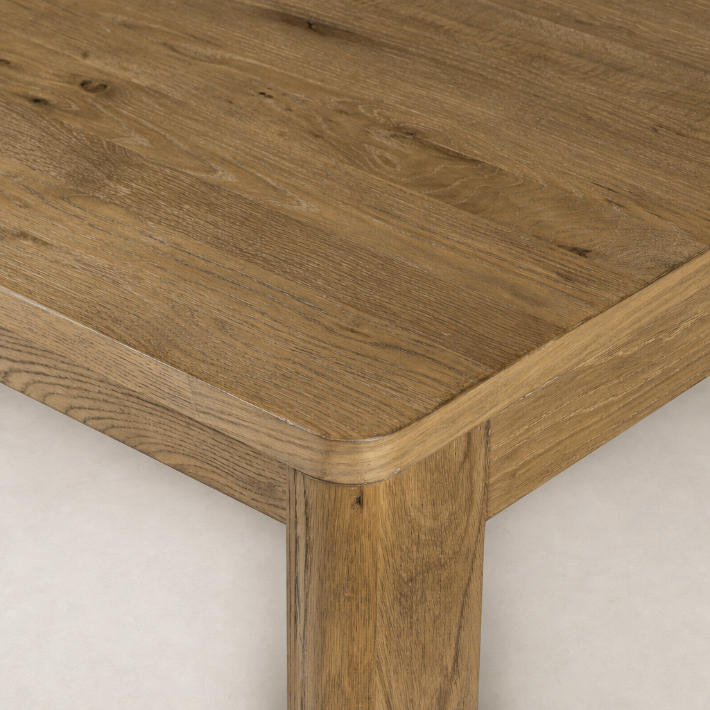 Stratton Extension Dining Table in Resawn Worn Oak with a smooth, rounded edge finish.