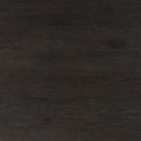 Close-up of the cracked smoked black finish on the Stratton Extension Dining Table.