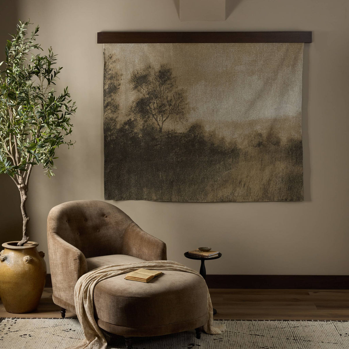Highland Haze by Aileen Fitzgerald in Hillside Haze, featuring a cozy chair and decorative wall art.