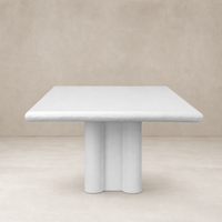 Selby Dining Table in plaster molded concrete with a sleek, modern design.
