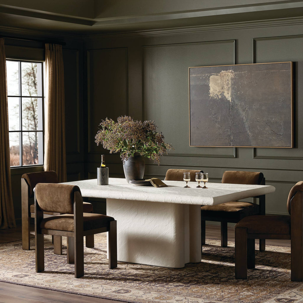 Selby Dining Table in plaster molded concrete with a smooth surface and modern design.