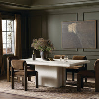 Selby Dining Table in plaster molded concrete with a smooth surface and modern design.