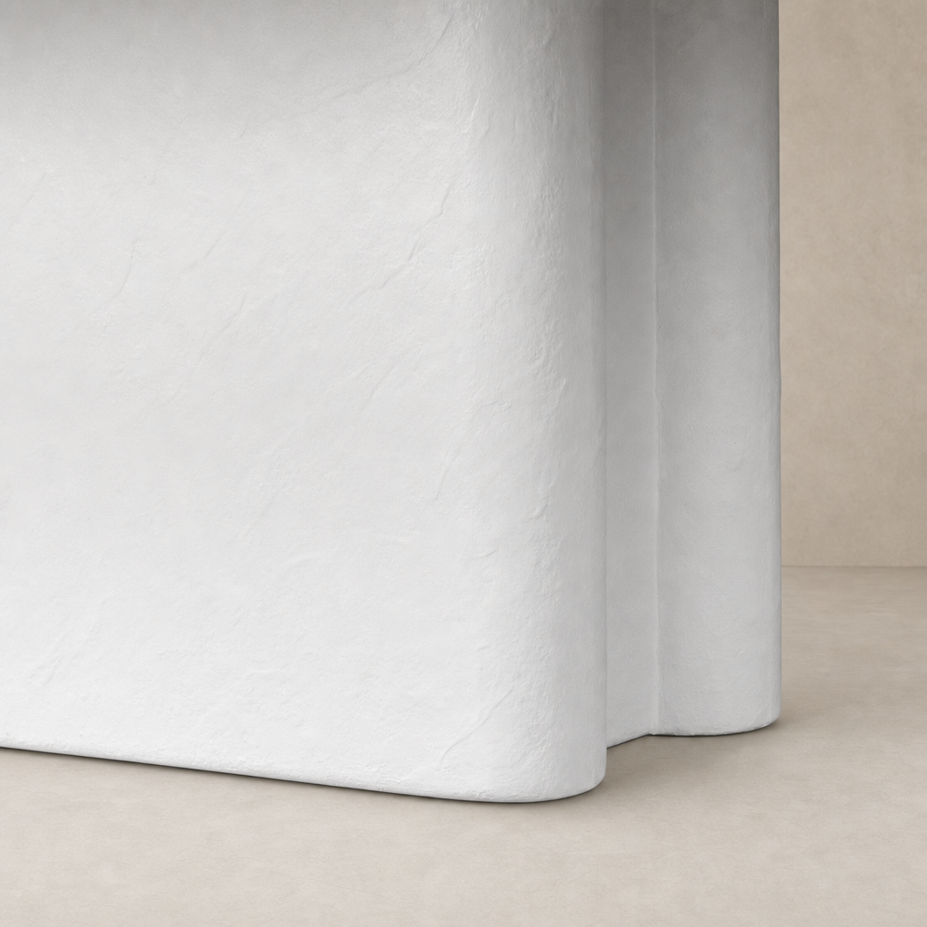 Plaster molded concrete Selby dining table with a smooth, modern finish.
