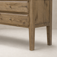 Worn Oak Lagos Cabinet featuring two drawers and sturdy legs in a natural finish.