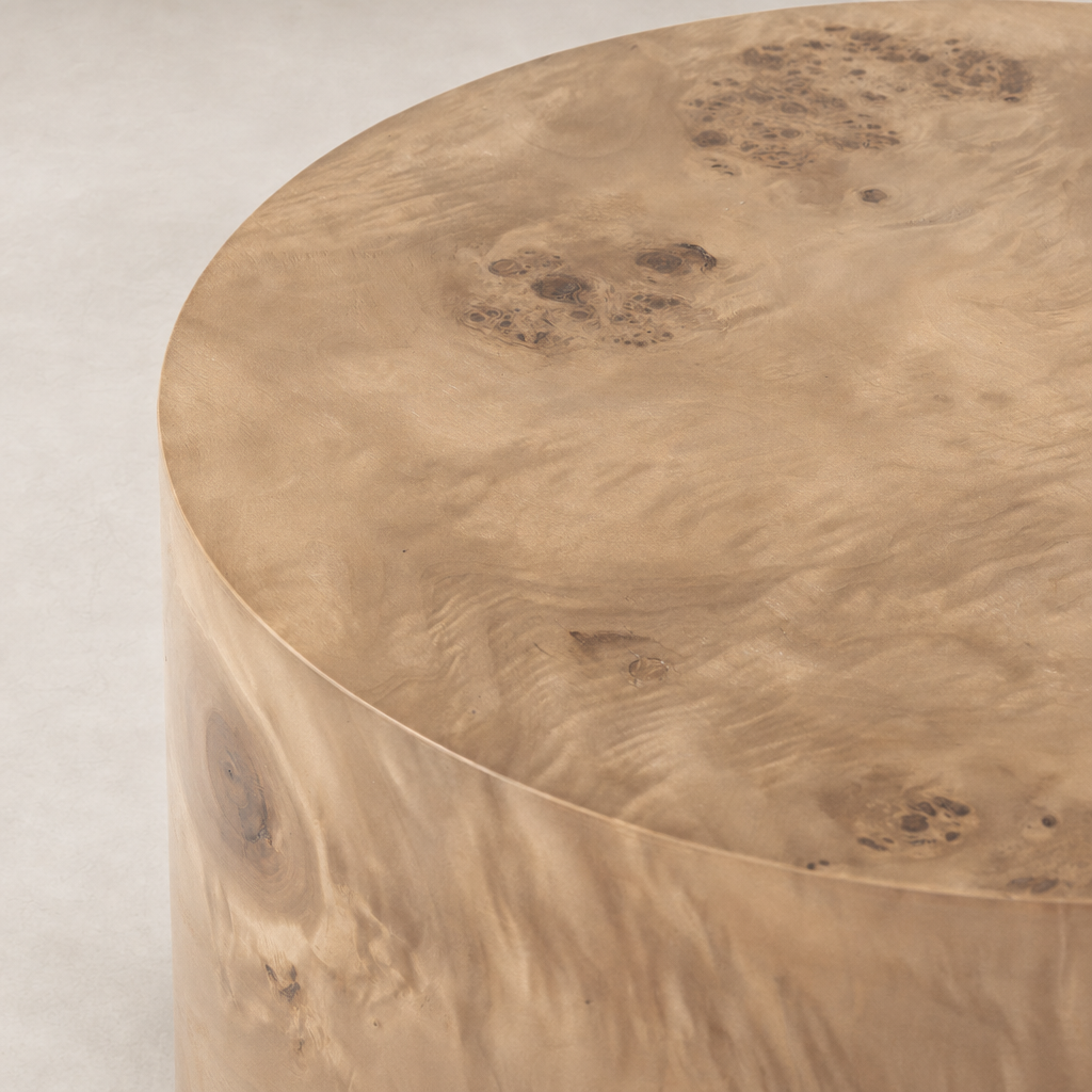 Zuri End Table featuring a smooth, natural wood finish with unique grain patterns.