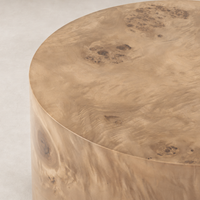 Zuri End Table featuring a smooth, natural wood finish with unique grain patterns.