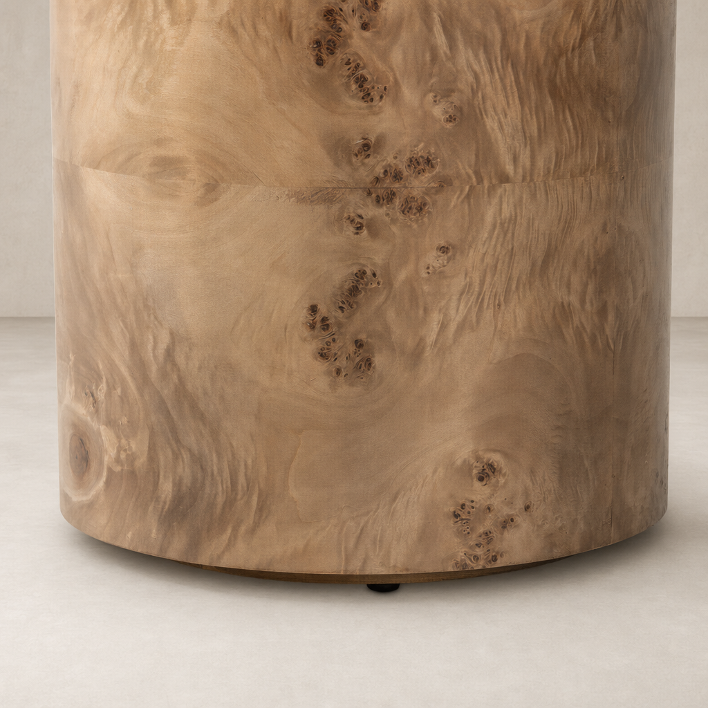 Zuri End Table featuring a smooth, rounded wood surface with natural grain patterns.