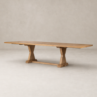 Lucia Extension Dining Table in Worn Oak with a rustic, sturdy design and unique legs.