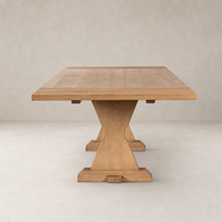 Lucia Extension Dining Table in Worn Oak with a square top and unique cross legs.