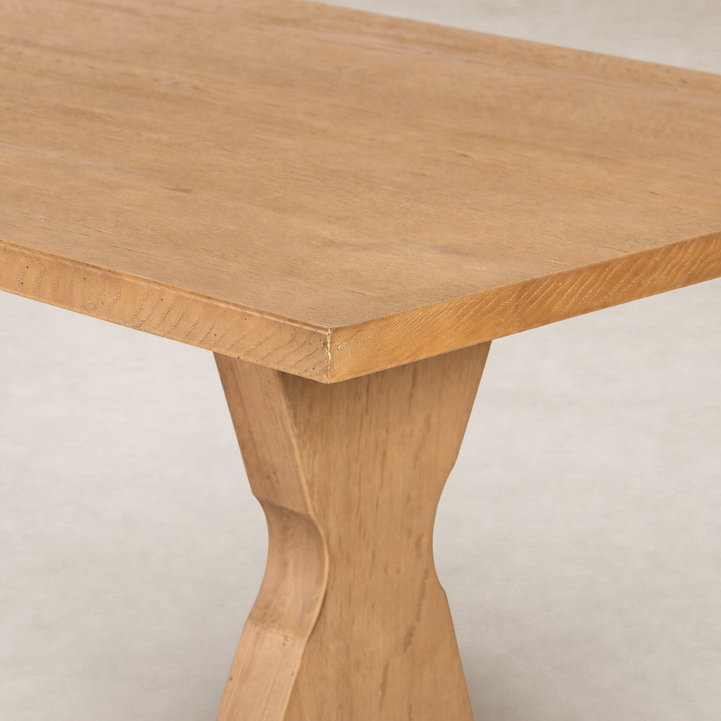 Lucia Extension Dining Table in Worn Oak with a sleek, modern design and unique tapered legs.