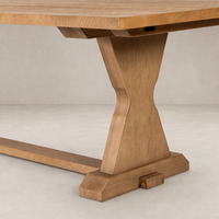 Lucia Extension Dining Table features a unique worn oak finish and elegant tapered legs.