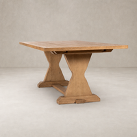 Lucia Extension Dining Table in Worn Oak with a sleek, sturdy design and unique base.