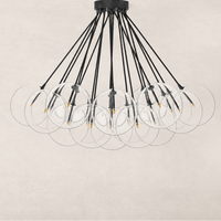 Modern black gunmetal chandelier with multiple circular glass shades.