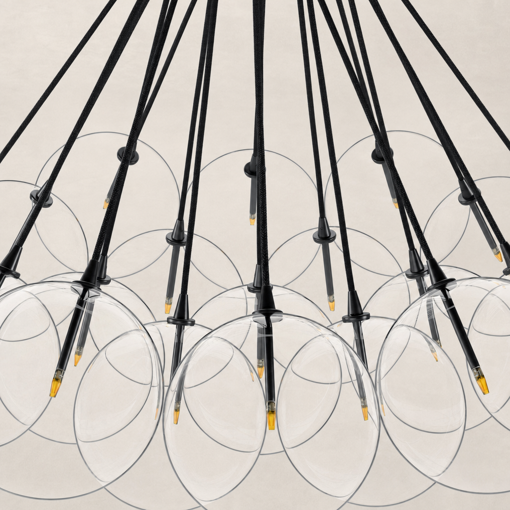 Black gunmetal chandelier with clear glass globes and adjustable cords.