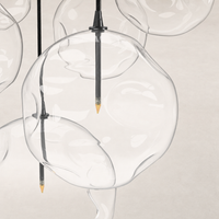 Black gunmetal 7 Mix Chandelier featuring round glass bubble shades.