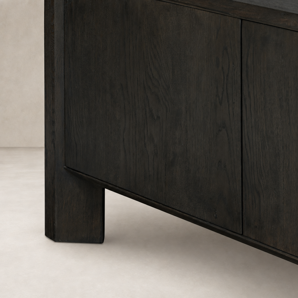 Close-up of the Zuma Wide Bookshelf in Smoked Black Oak, highlighting its sleek, modern finish.