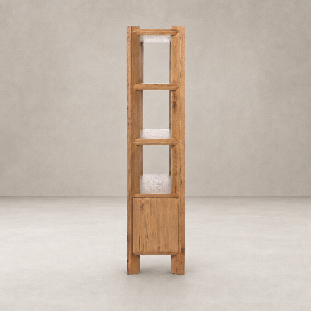 Zuma Wide Bookshelf in worn oak, featuring four open shelves and a closed cabinet.