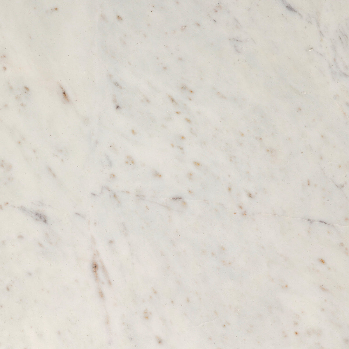 Polished white marble surface of the Ilaria Round Dining Table 42, showcasing natural veining.