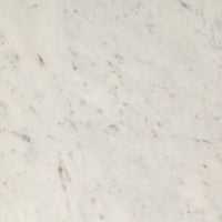Polished white marble surface of the Ilaria Round Dining Table 42, showcasing natural veining.