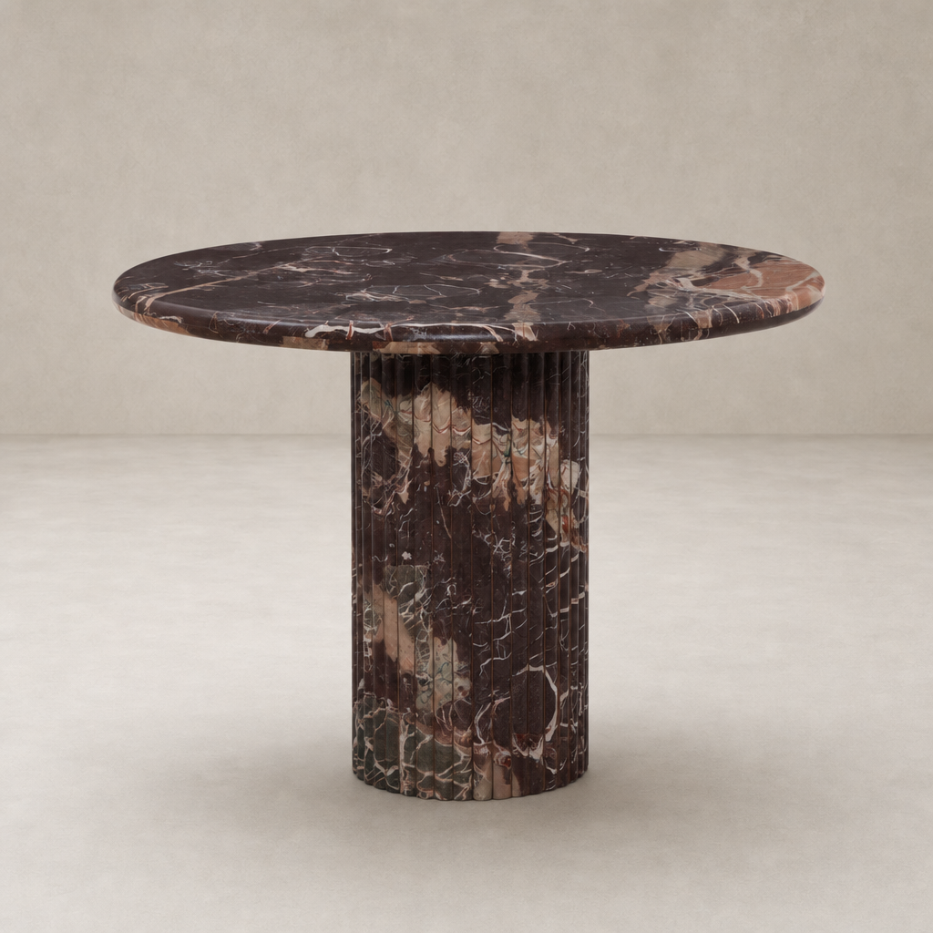 Ilaria Round Dining Table 42 in Merlot Marble with a ribbed pedestal base.