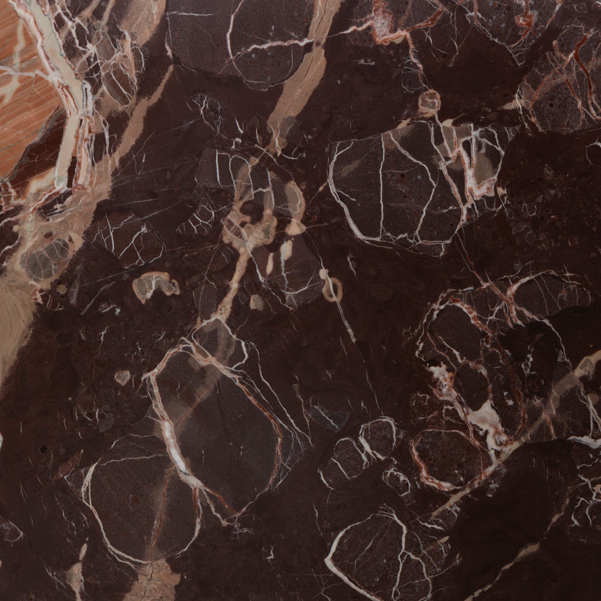 Merlot marble finish of the Ilaria Round Dining Table 42 showcasing intricate textures.