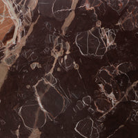 Merlot marble finish of the Ilaria Round Dining Table 42 showcasing intricate textures.