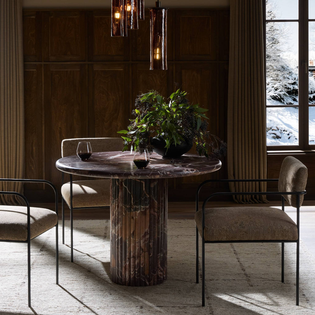 Ilaria Round Dining Table 42 in Merlot Marble with a polished round top and fluted pedestal.