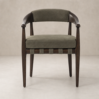 Nolan Dining Chair in Broadway Olive with sleek wood frame and textured upholstery.