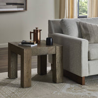 Brisa End Table features a rustic design with thick, sturdy legs and a textured wood finish.