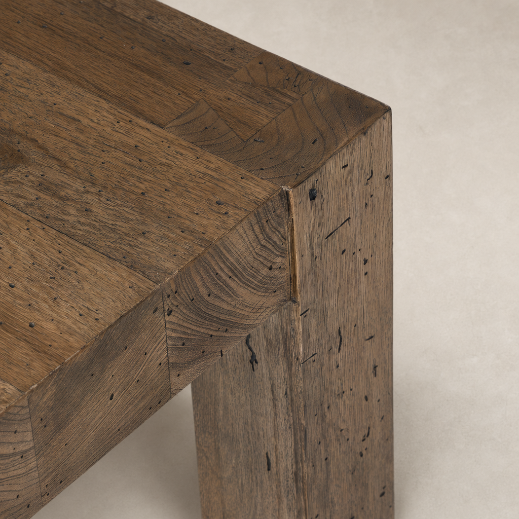 Brisa End Table featuring a rustic wood finish with visible grain and texture.