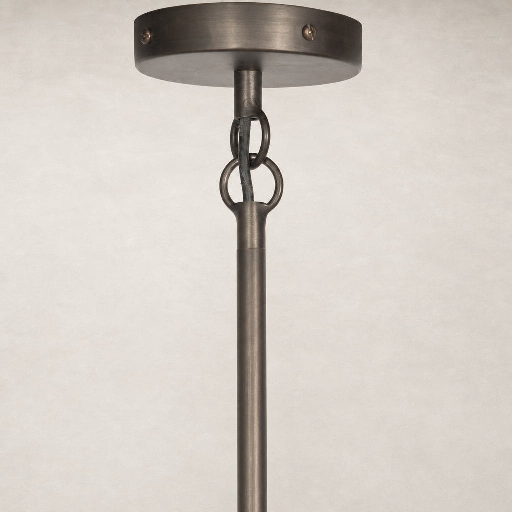 Light oil rubbed bronze chandelier with a sleek hanging rod and circular canopy.