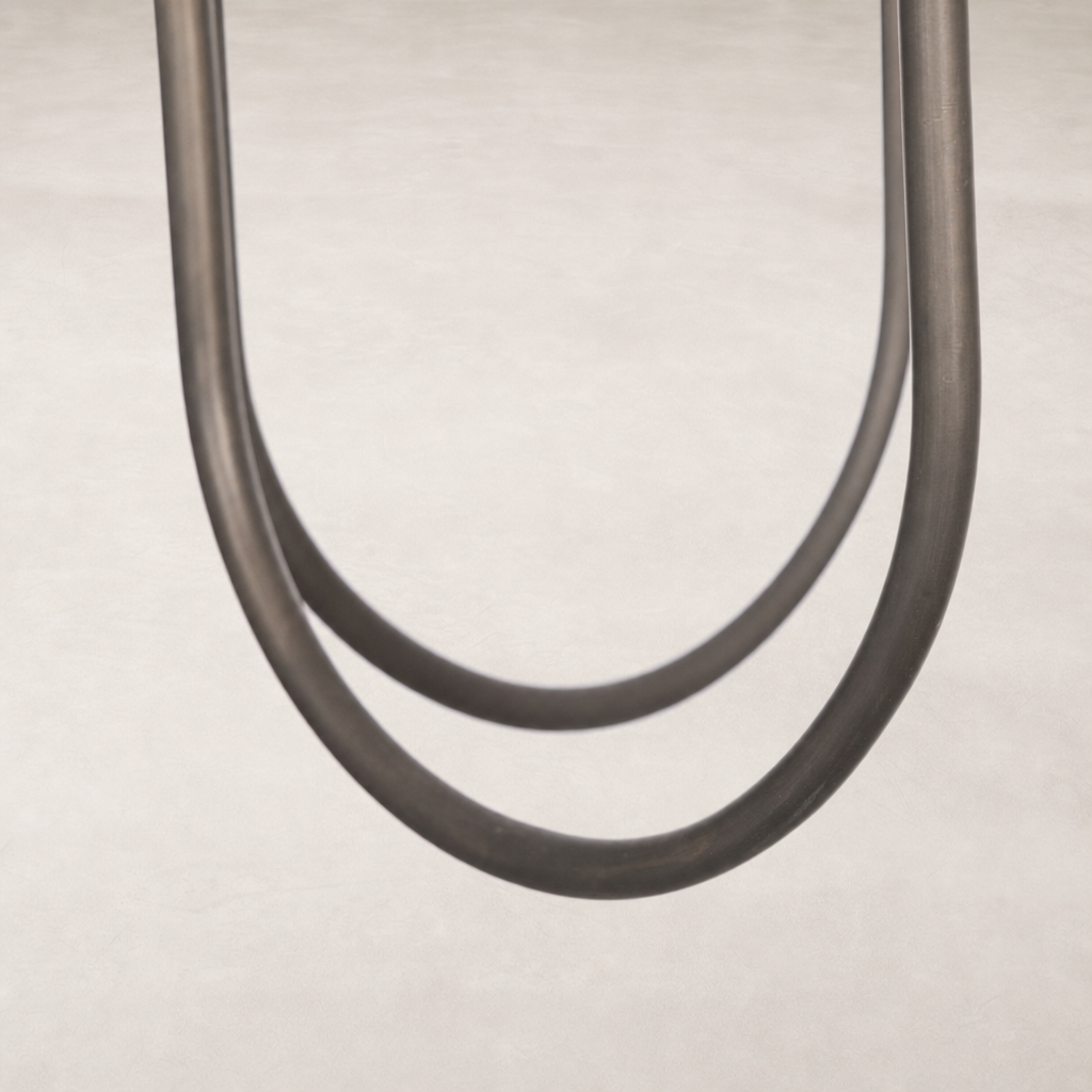 Light oil rubbed bronze chandelier featuring elegant curved lines and a smooth finish.
