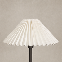 Light oil rubbed bronze chandelier with pleated white fabric shade.