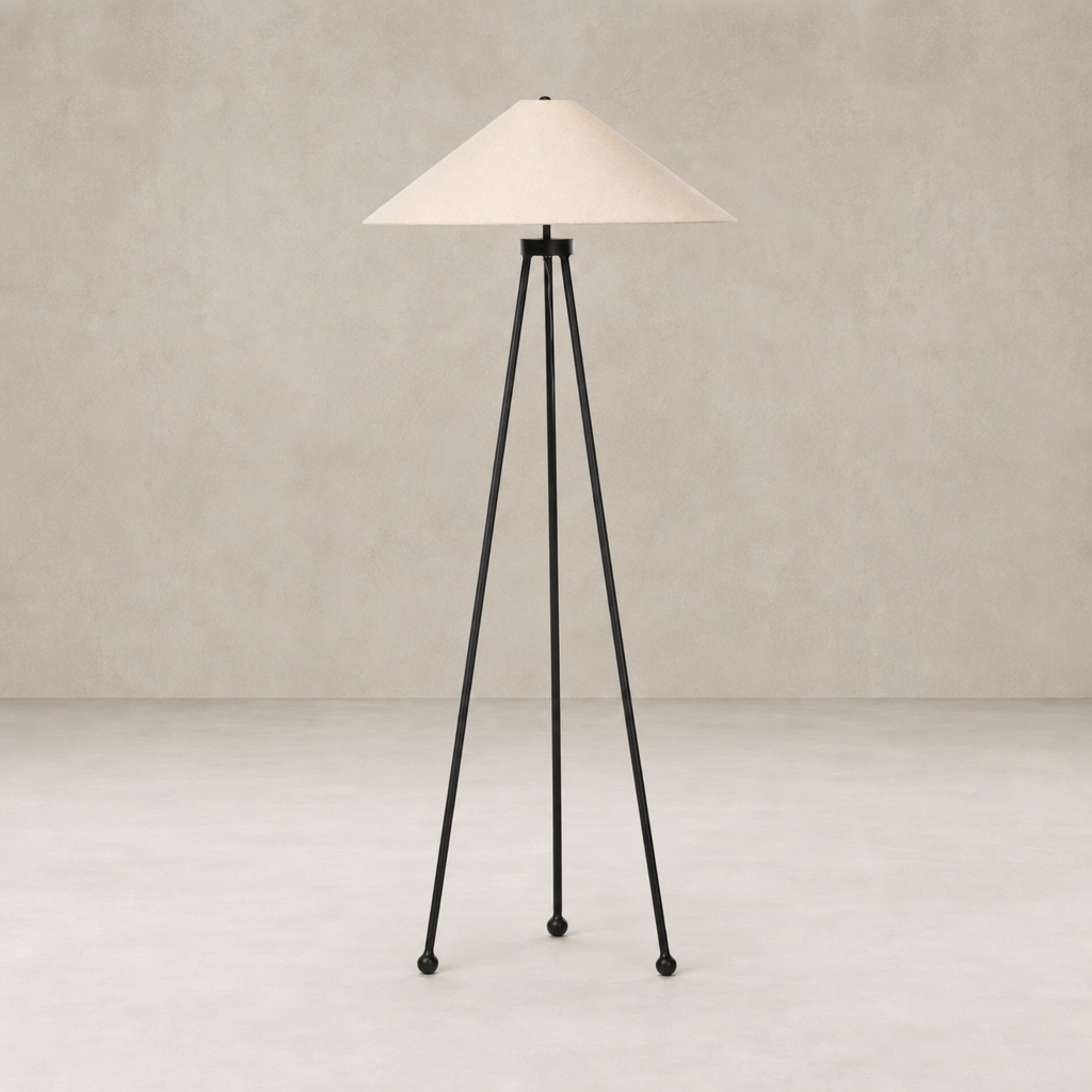 Matte black floor lamp with a conical fabric shade and tripod design.