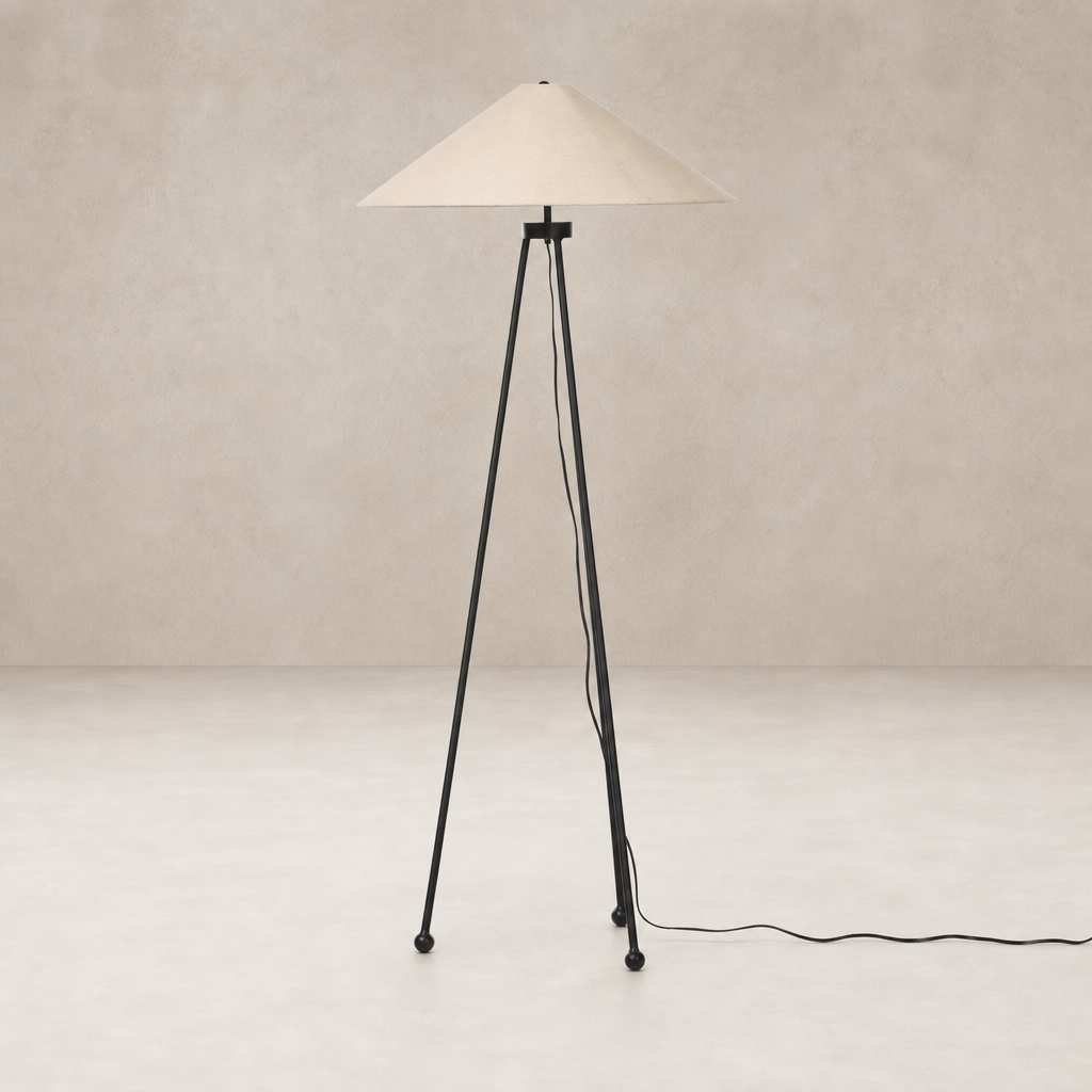 Matte black floor lamp with a conical shade and elegant tripod base.