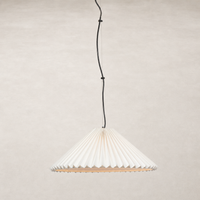Jet black pendant light with pleated design and elegant silhouette.