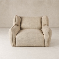 Allora Swivel Chair in Saxon Sand, featuring a plush, textured design and modern silhouette.