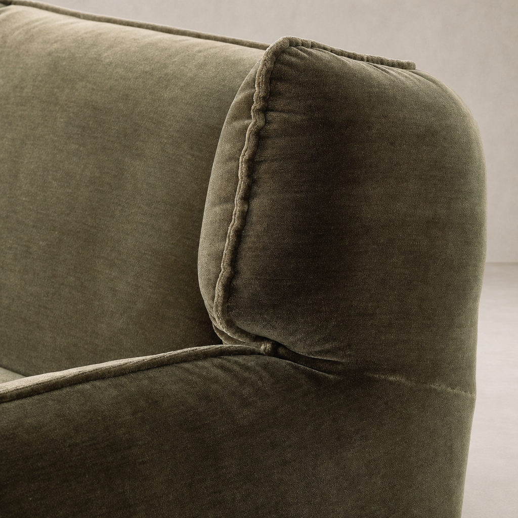 Allora Swivel Chair in Monte Olive with plush, textured upholstery and distinctive piping detail.