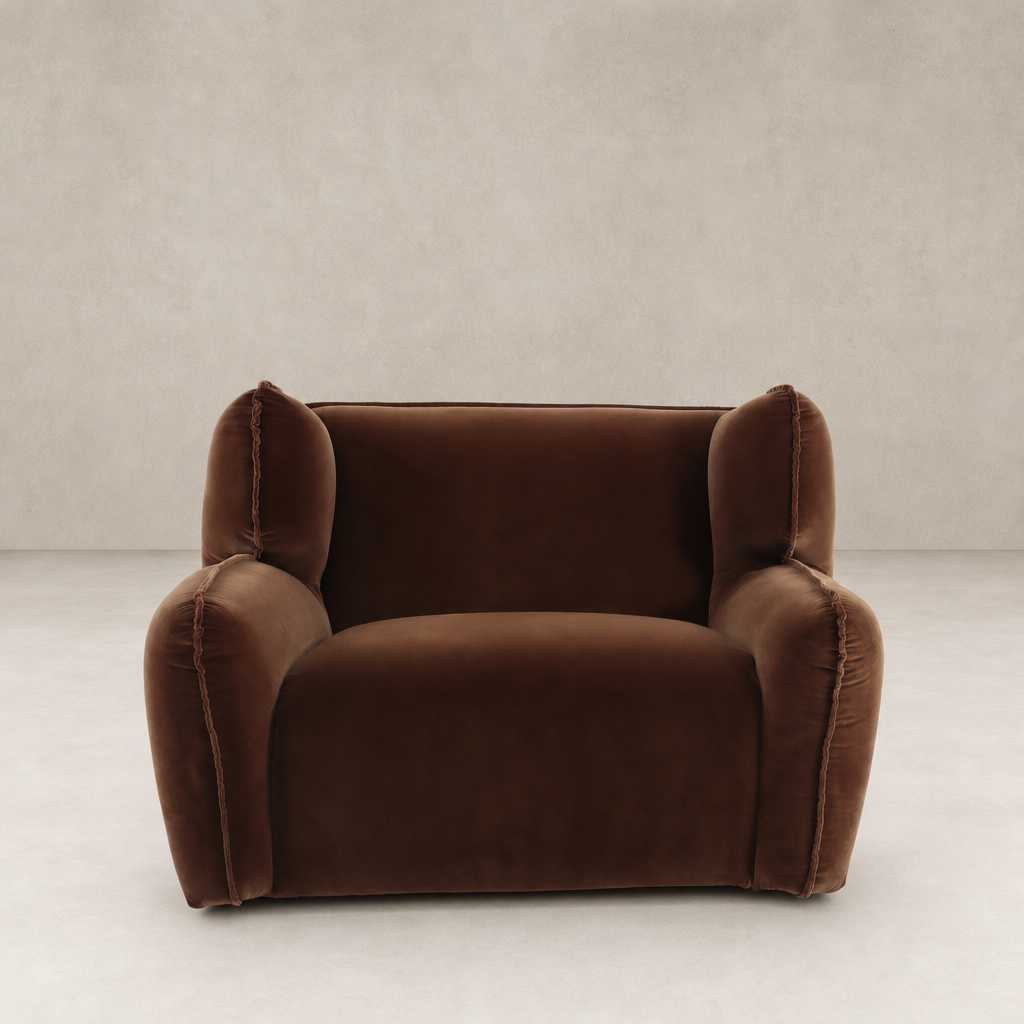 Allora Swivel Chair in Surrey Ochre, featuring plush, rounded arms and soft velvet upholstery.