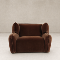 Allora Swivel Chair in Surrey Ochre, featuring plush, rounded arms and soft velvet upholstery.