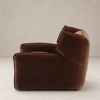Allora Swivel Chair in Surrey Ochre featuring plush upholstery and modern silhouette.