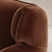 Allora Swivel Chair in Surrey Ochre with plush velvet texture and stitched detailing.