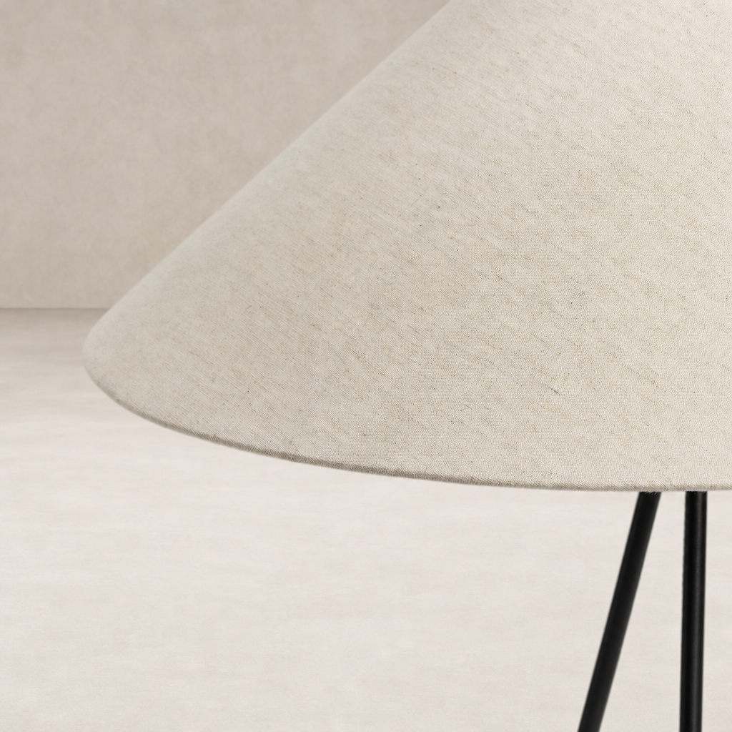 Matte black table lamp with a stylish conical shade design.