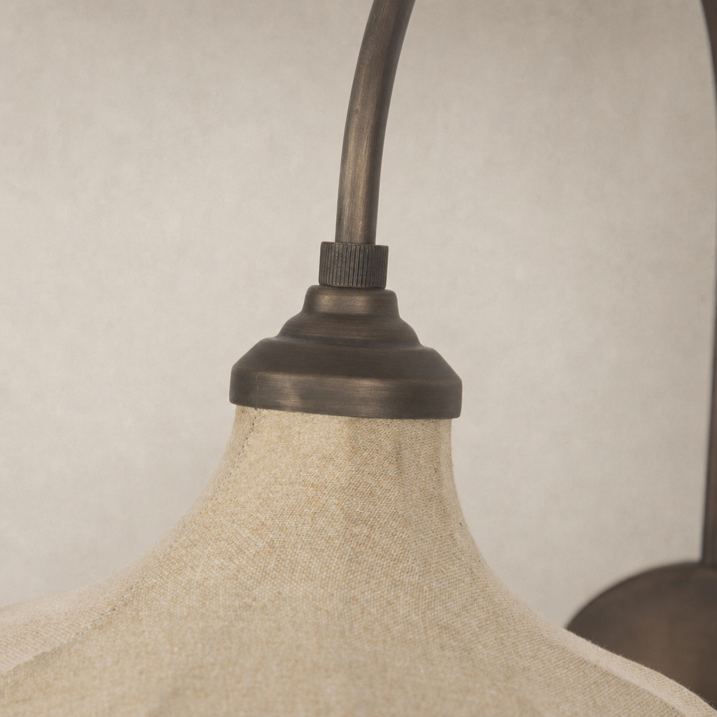 Light Oil Rubbed Bronze Waverly Sconce showcasing elegant texture and graceful silhouette.